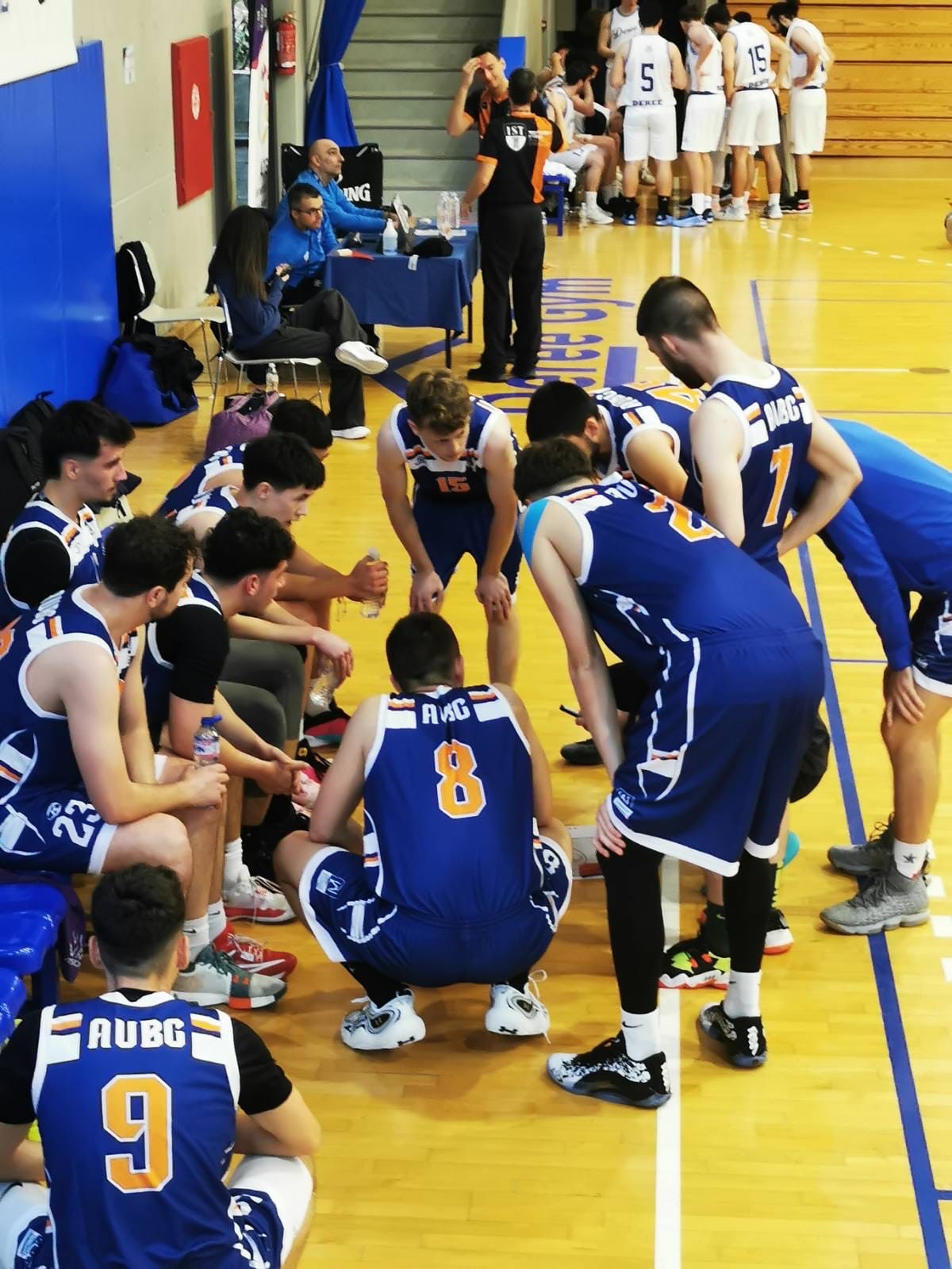 The AUBG basketball team discussing tactics. Photo courtesy of Boyan Tenev.