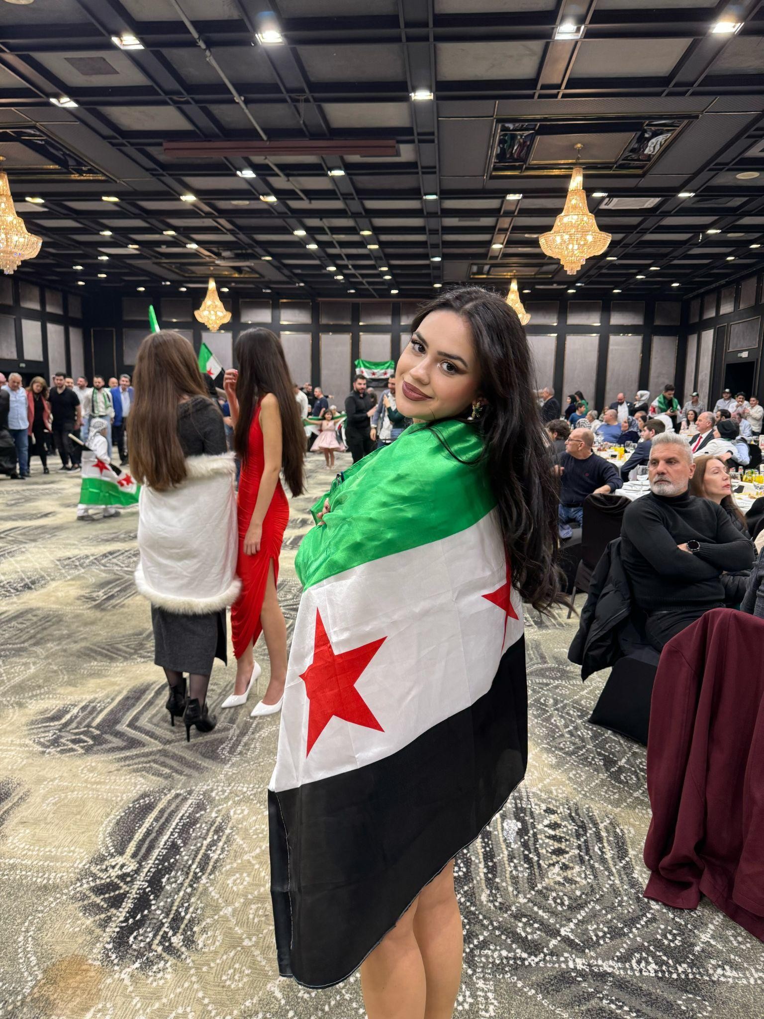 Nadine with the new Syrian flag. Personal Archive
