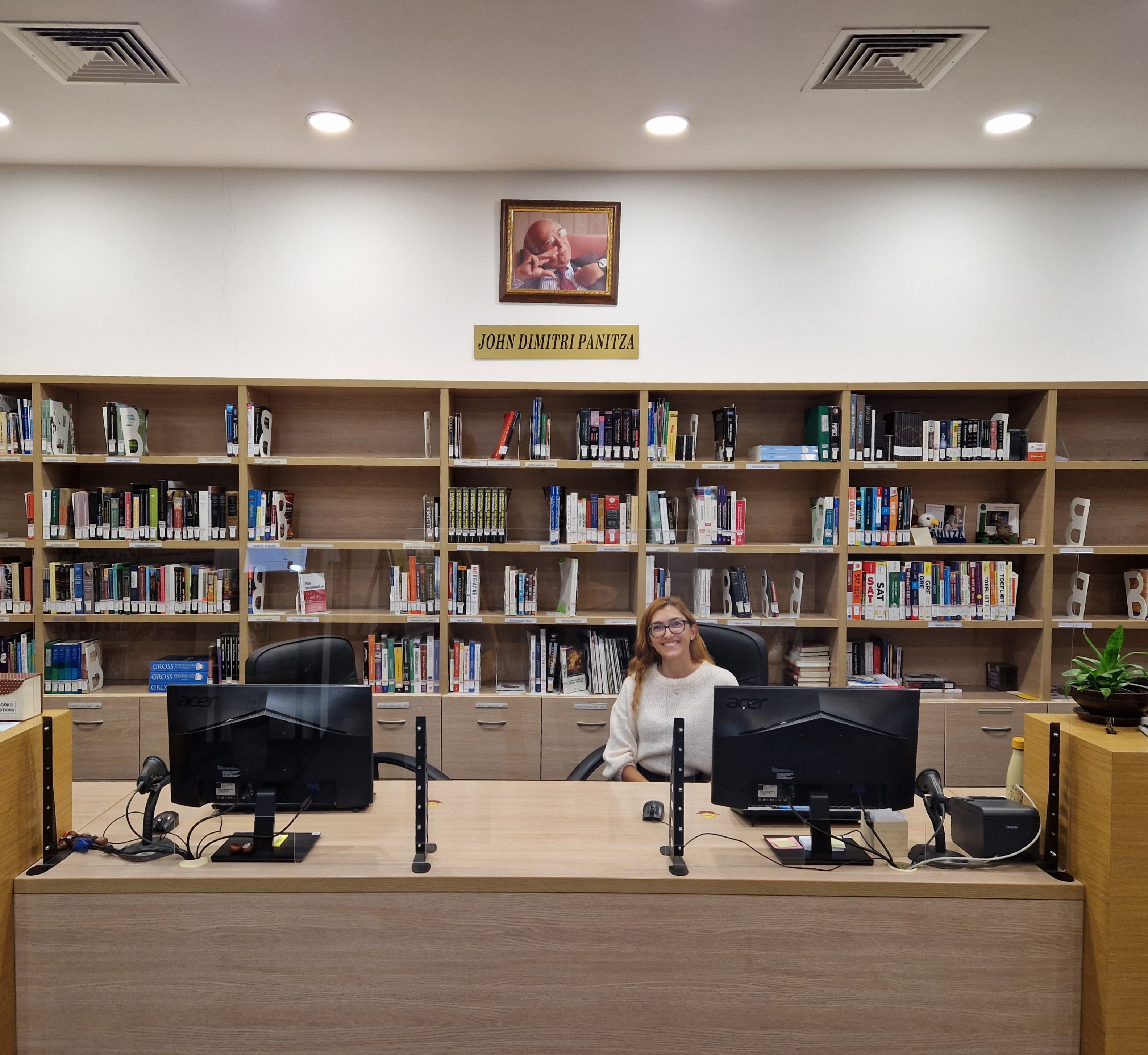 Radina at her desk in Panitza Library. Borislav Bochev for AUBG Daily.