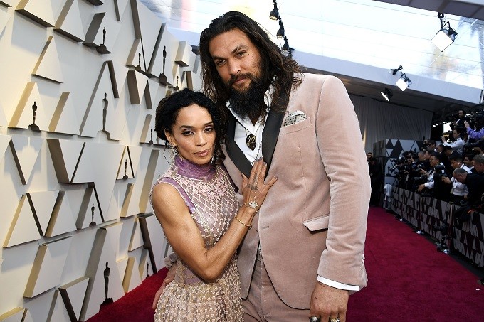 Jason Momoa and his wife honored Lagerfeld by wearing matching outfits designed by him | Retrieved from https://www.complex.com